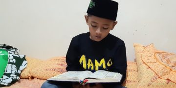 Isi Libur Sekolah, Fikri Haikal Abdul Karim Membaca Al-Qur’an  